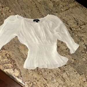 Youth medium white peasant blouse with smocked waist and camisole.